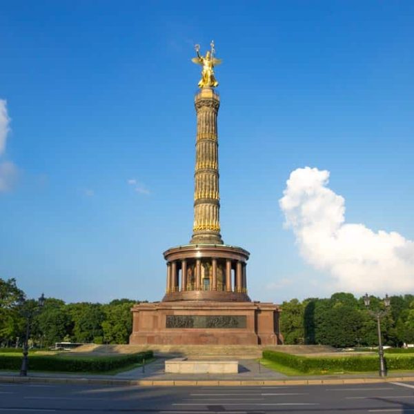 The Victory Column (Siegessäule) surrounded by traffic and green spaces in Tiergarten