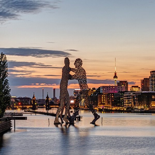 molecule man and spree panorama in berlin friedrichshain